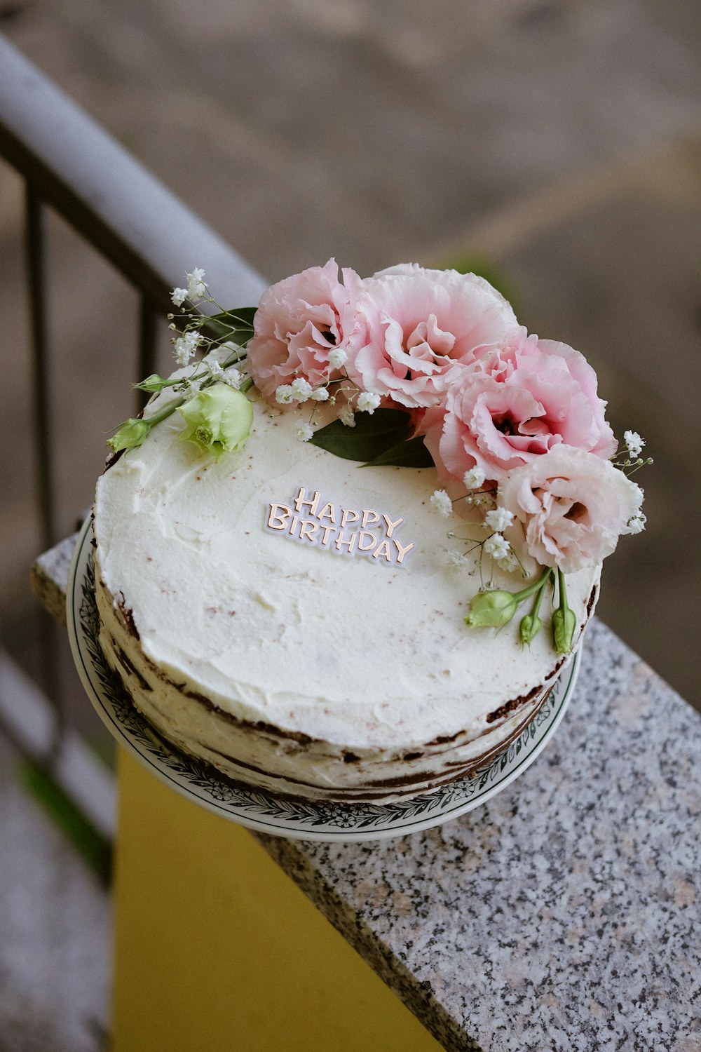 A celebration cake decorated with delicate flowers
